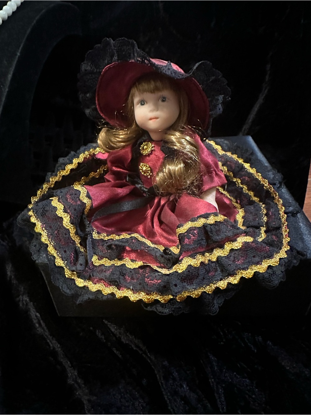 Porcelain Collectible Doll in Burgundy and Black - Picture 3 of 9